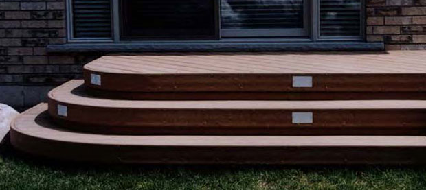 Composite deck with low voltage lighting in the steps.