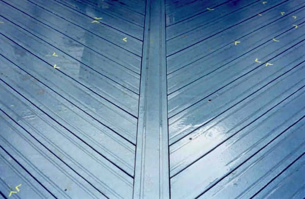 A pattern board is installed where cut ends of angled deck boards meet.
