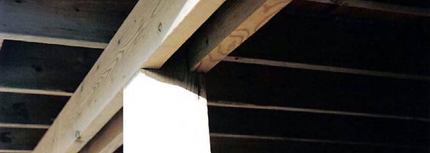 Double beam attached to a notched post for a more aesthetically pleasing look.