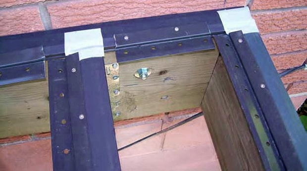 Deck sub-structure with Shadoe Track and joist cap joint covered with tape to maintain water tight joint.
