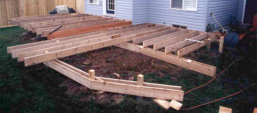 Deck sub-structure showing outside rim joist installation.