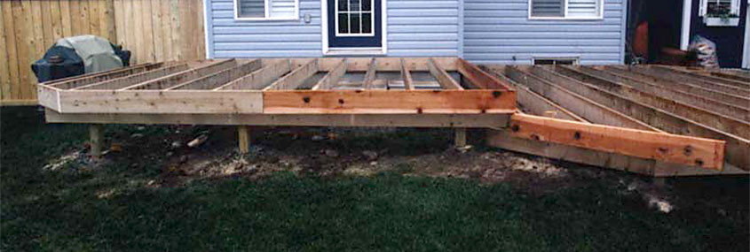 Deck sub-structure showing outside rim joist installation.