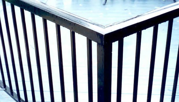 Aluminum railing top corner detail.