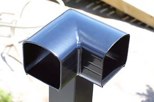 Top mount cover sleeve for aluminum railing corner.
