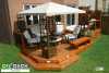 Two-level cedar deck with planters and a bench and privacy screen.