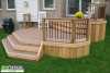 Medium size 2-level deck with composite decking.